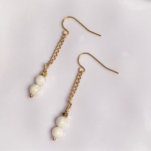 25. White Shell Dangle Earrings